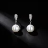 S925 Silver CZ Paved Shell Pearl Drop Earrings S925 Silver CZ Paved Shell Pearl Drop Earrings