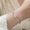 S925 Silver Hetian Jade Lotus Charm Bracelet